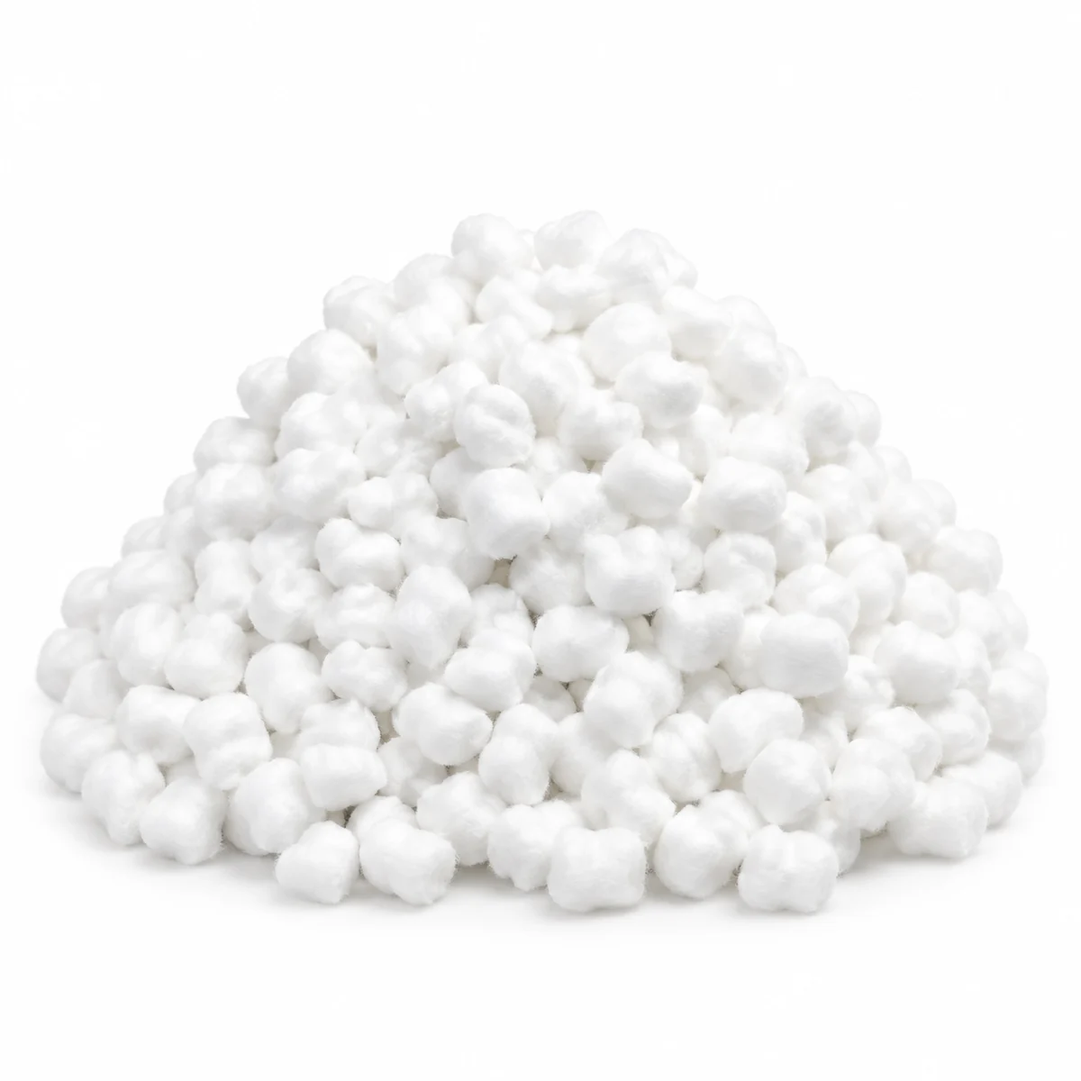 A pile of white absorbent cotton balls, on a white background