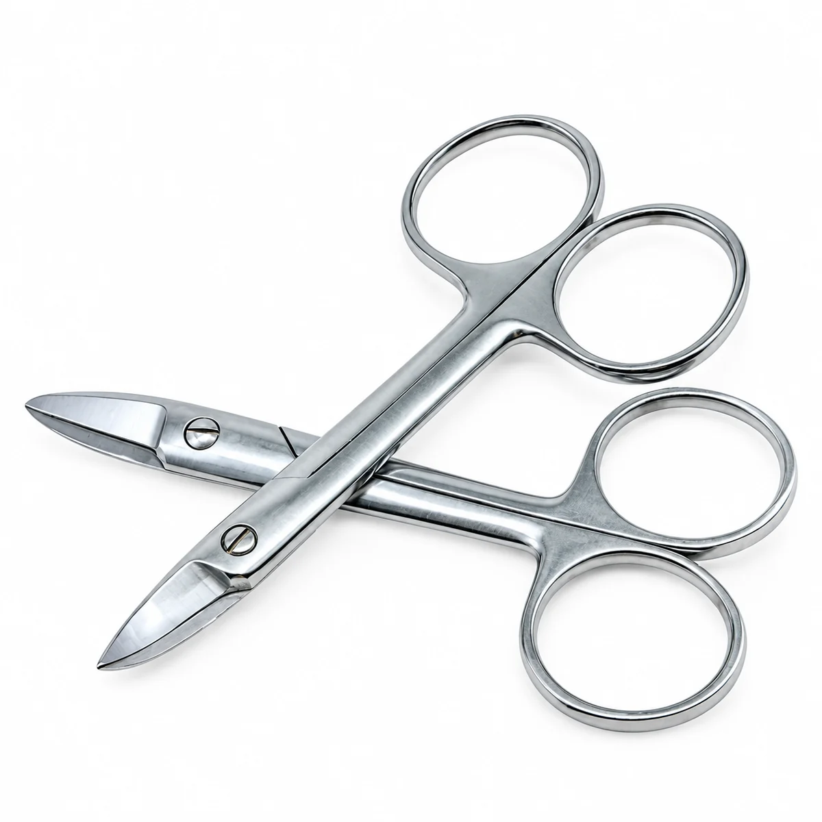 Two stainless steel dental crown scissors, one with a straight tip and one with a curved tip, on a white background