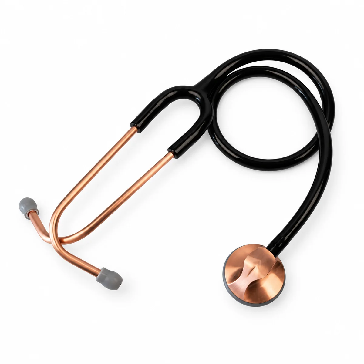 Single-tube manual stethoscope with black tubing and a copper-coloured chest piece, on a white background